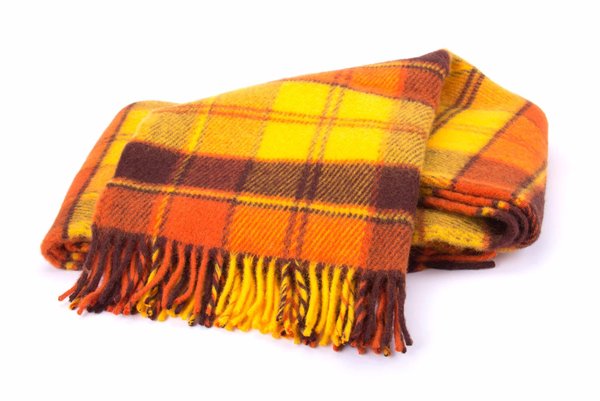 Comment associer un poncho plaid à sa tenue quotidienne ?